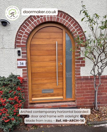 contemporary arched door and frame made from Iroko