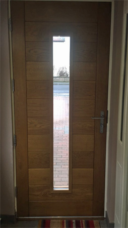 contemporary oak door with lever handles