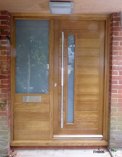 contemporary oak door with part glazed side panel