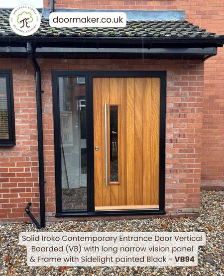 contemporary iroko door and black frame with sidelight