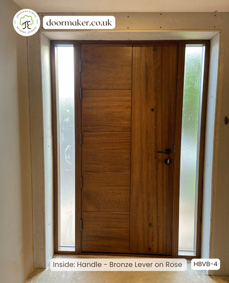 contemporary iroko door and sidelights long bronze handle