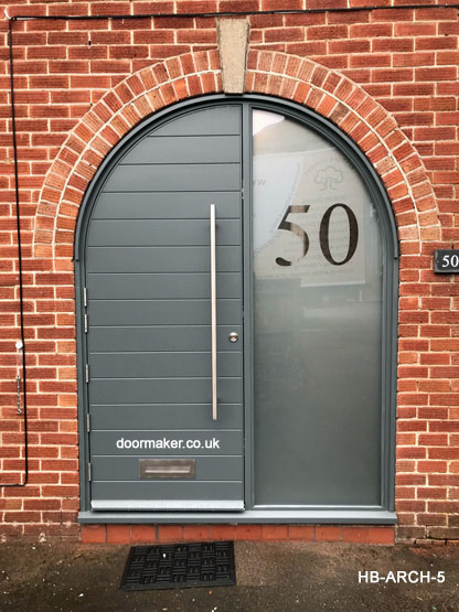 contemporary arched door and frame with sidelight 