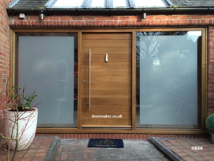 contemporary oak door and frame with wide sidelights