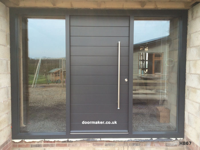 contemporary grey door and frame with side panels